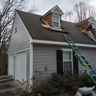 Roofers install a roof.