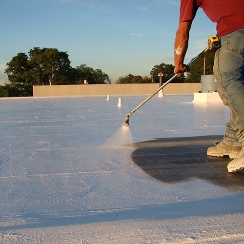 A flat roof coating application
